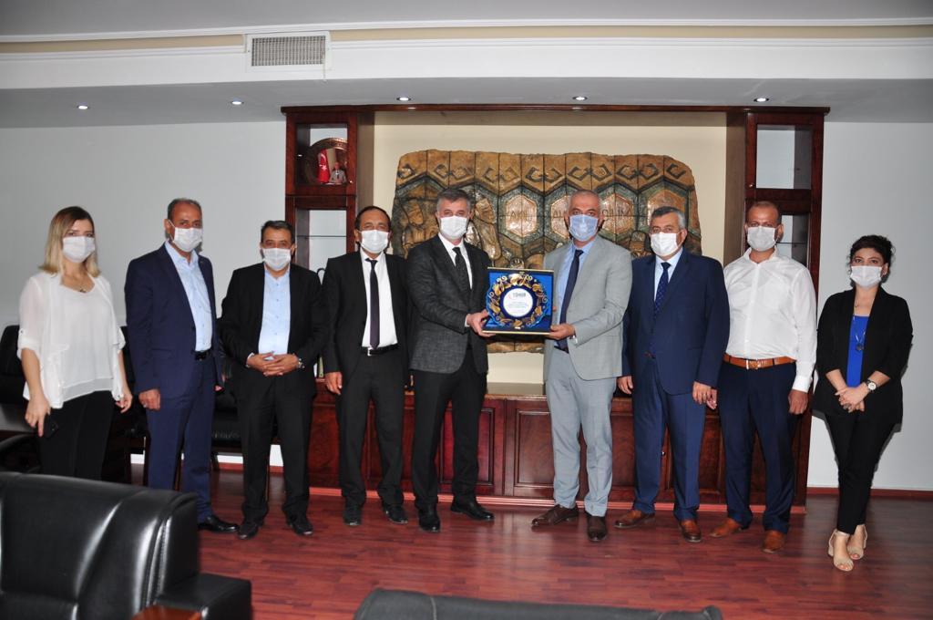 ÖHO Esnaf Odası Başkanı Göksel Ovacık, TÖHOB heyeti ile Adana Esnaf Birliğini ziyaret etti
